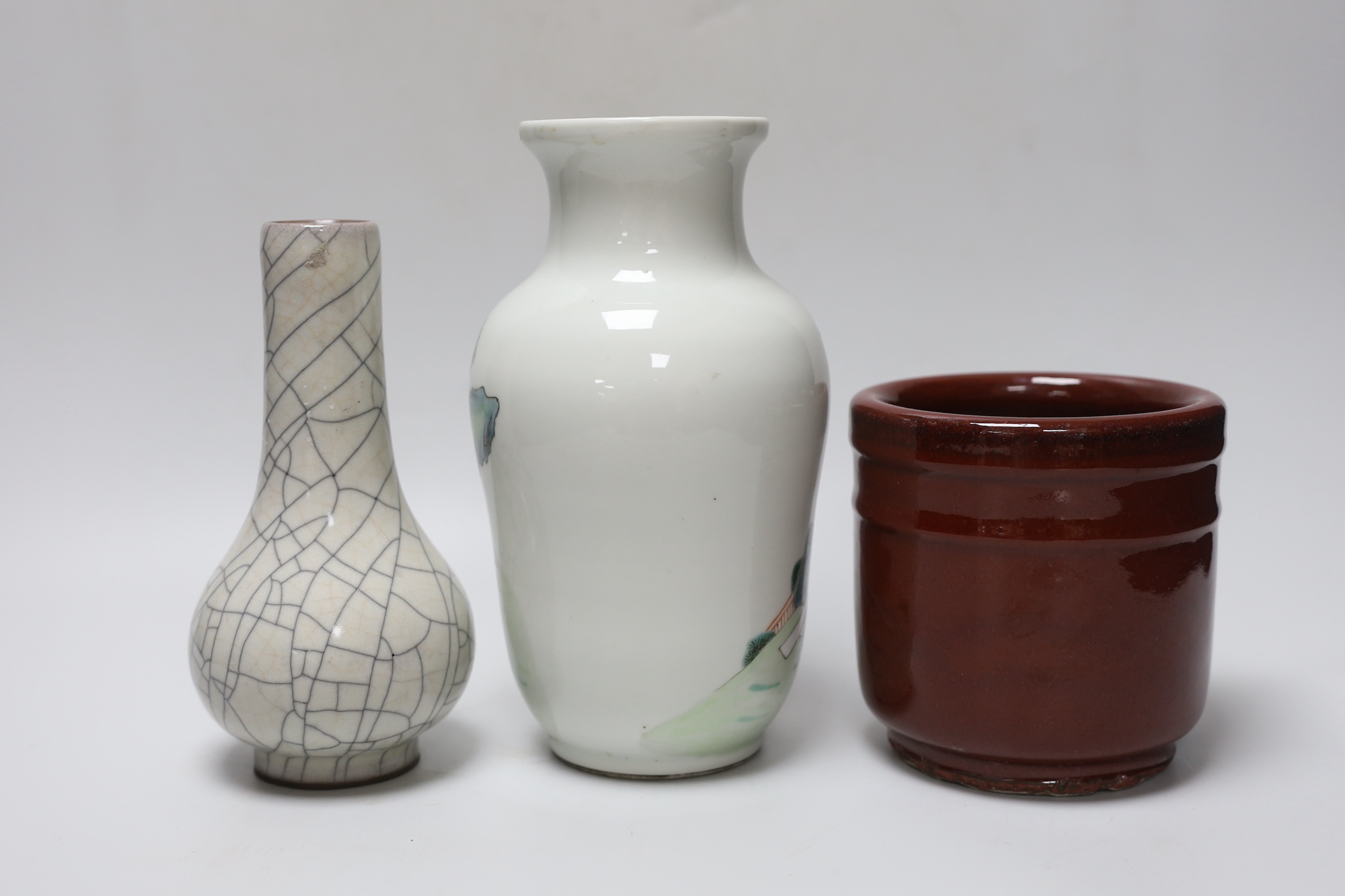 A Chinese famille rose vase, a crackle glaze vase and a sang de boeuf jar, tallest 21.5cm